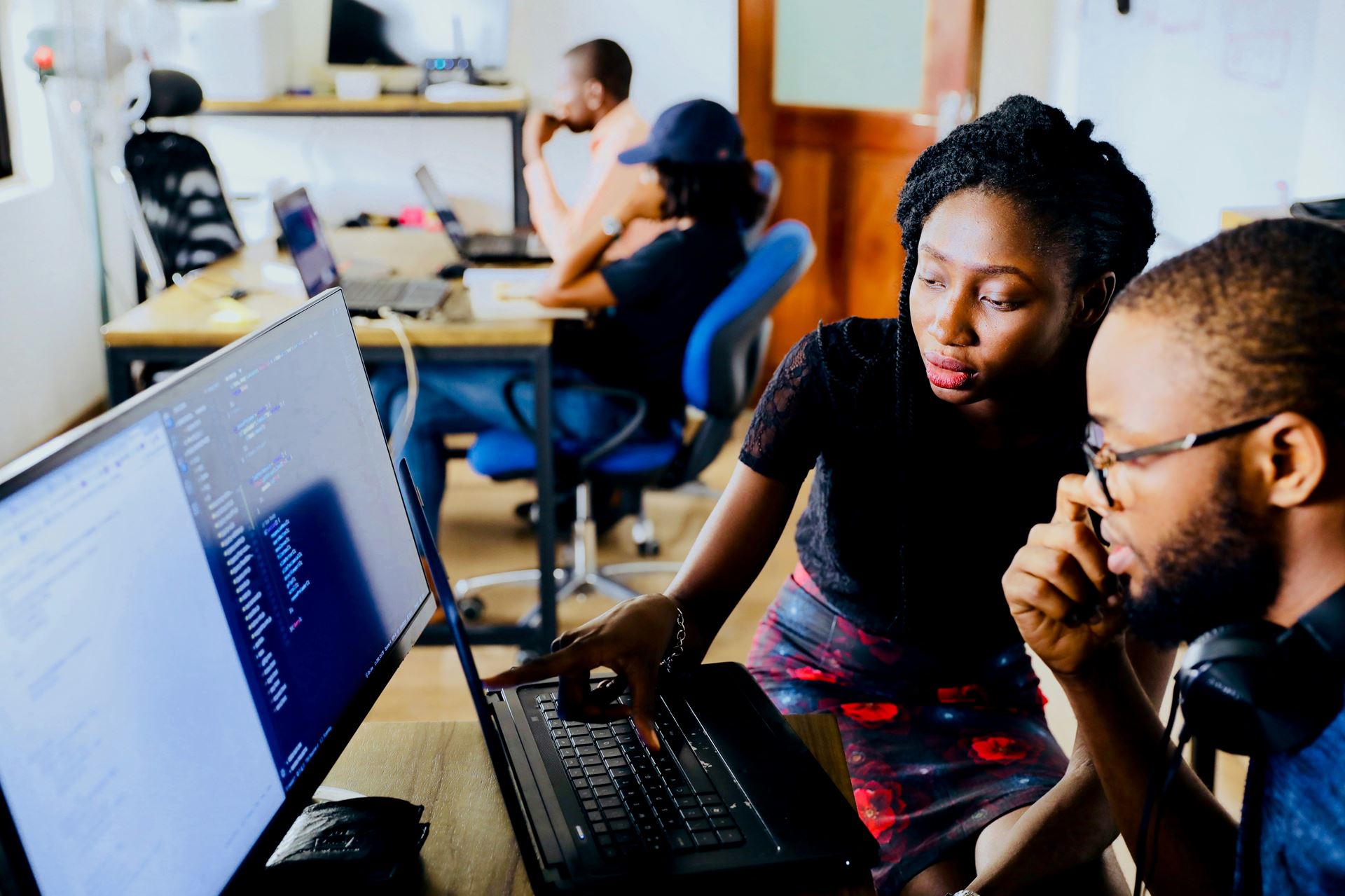 People checking a computer